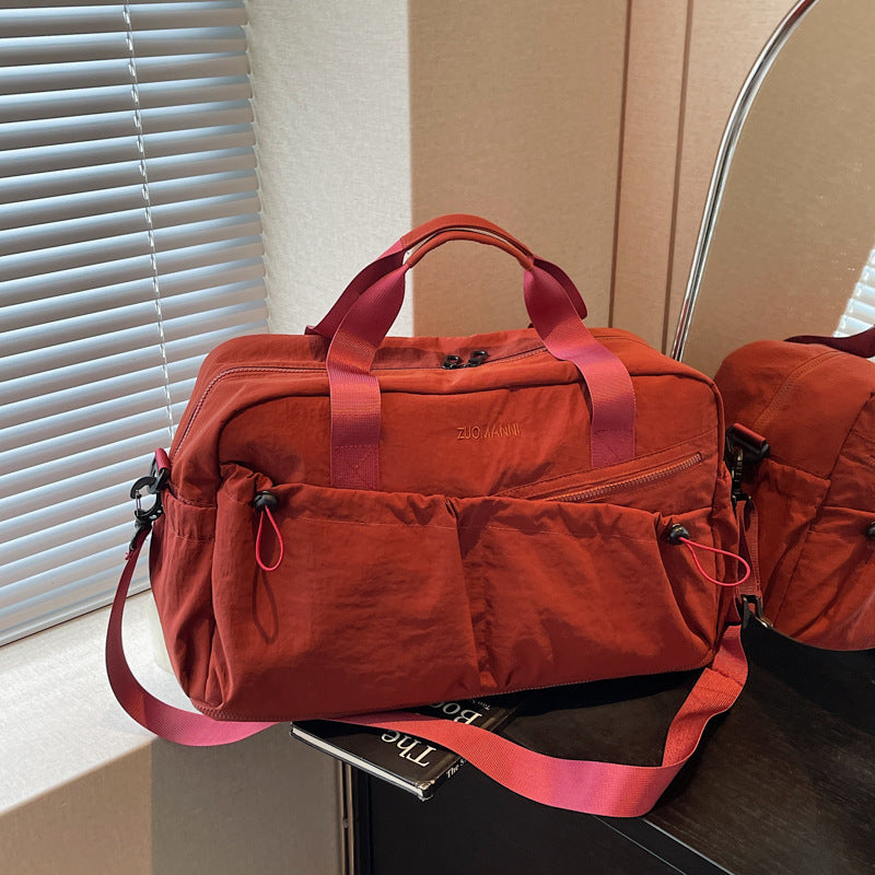Sporty and Functional Travel Bag with Multiple Exterior Pockets