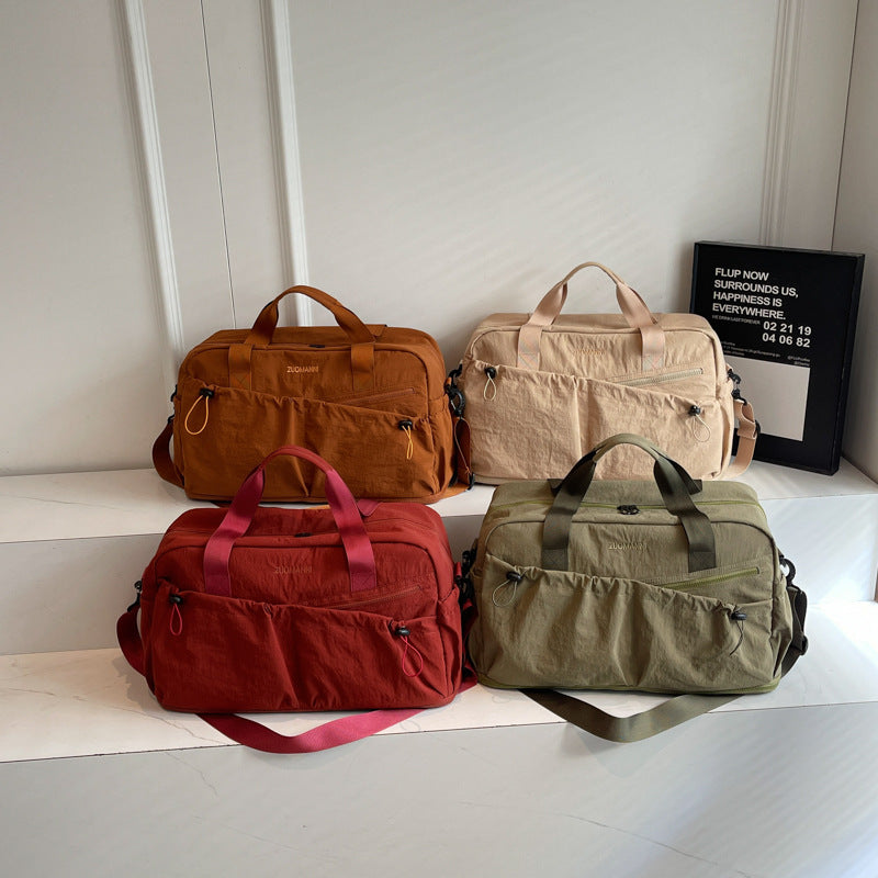 Sporty and Functional Travel Bag with Multiple Exterior Pockets