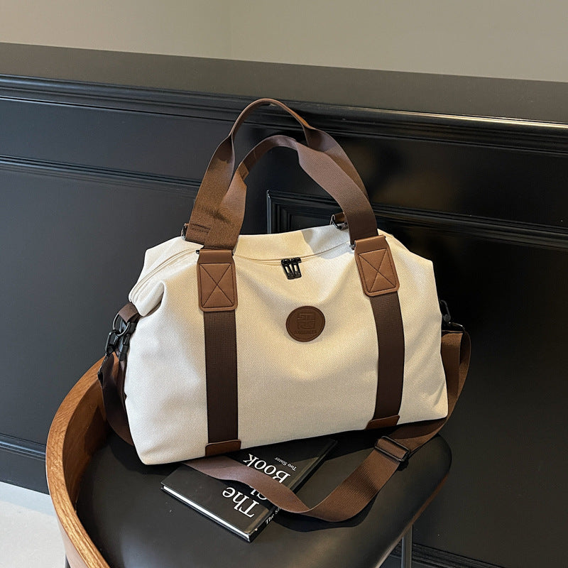 Sporty Duffel Bag with Multiple Compartments and Adjustable Shoulder Strap