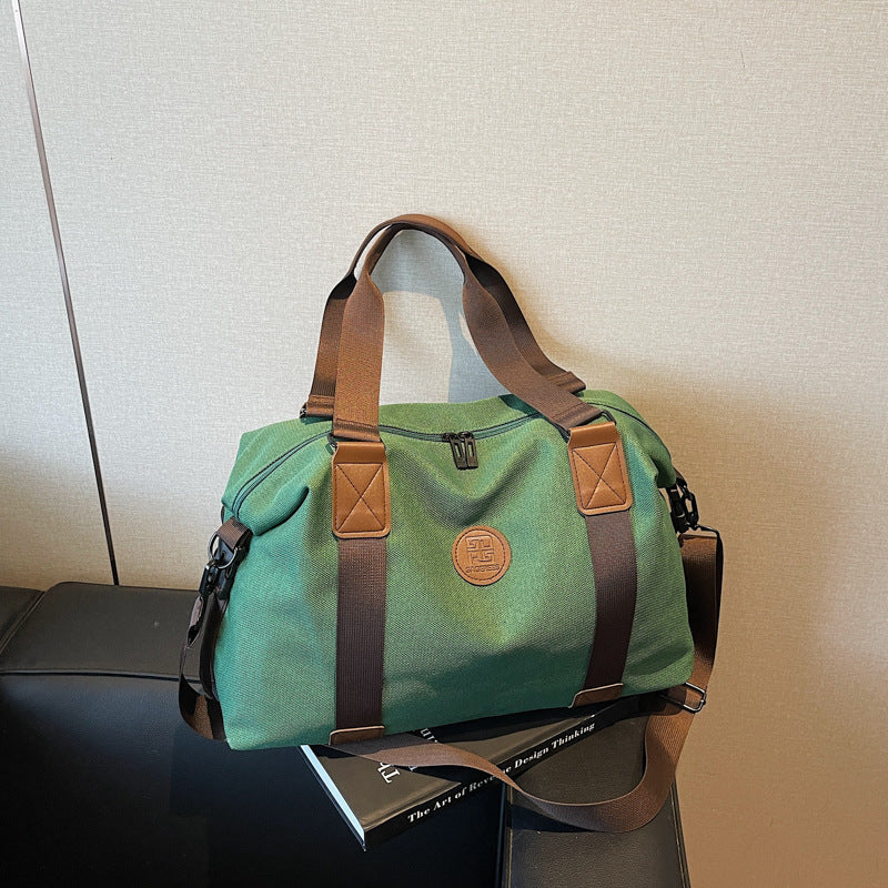 Sporty Duffel Bag with Multiple Compartments and Adjustable Shoulder Strap